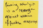 Piece of cloth with "Poisoning school girls is a revenge against Women Life Freedom movement." written.
