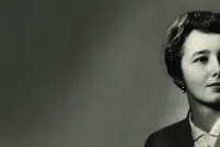 Black and white portrait of a woman looking to our right.