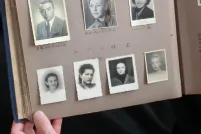 An open photo album contains black-and-white headshots of seven individuals and other annotated photos