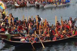 A couple hundred people in 20 canoes.