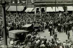 A large crowd gathered on a street