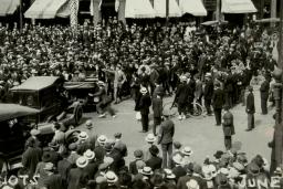 A large crowd gathered on a street