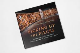 Cover of book depicting the title "Picking up the pieces"