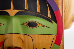 Carved wooden faces