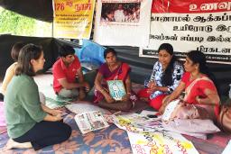 In the Sri Lankan city Vavuniya in 2017, Elaine Pearson meets with Tamil mothers protesting the enforced disappearance of their children during Sri Lanka's civil war.