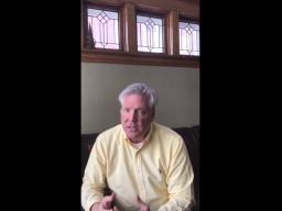 A man sitting on a couch.