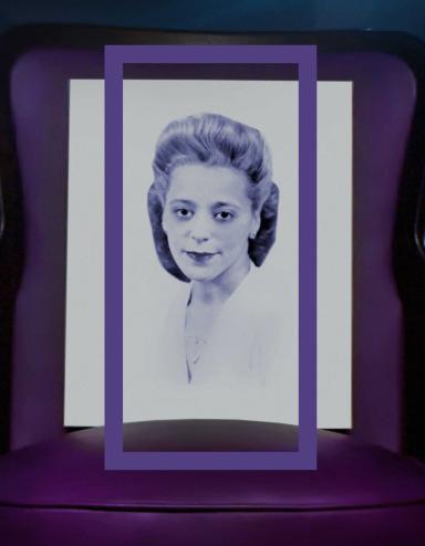 A head-and-shoulder portrait of Viola Desmond framed by a vertical purple rectangle. Viola is wearing a white top. Partially obscured.