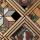 Portion of a large artwork consisting of objects set in cedar frames.