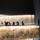 A group of people traveling up the Museum’s lighted alabaster ramps.