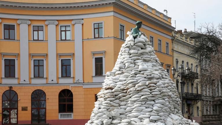 A monument of the city founder Duke de Richelieu is seen covered with sandbags for protection, amid Russia's invasion of Ukraine, in central Odessa on March 9. Partially obscured.