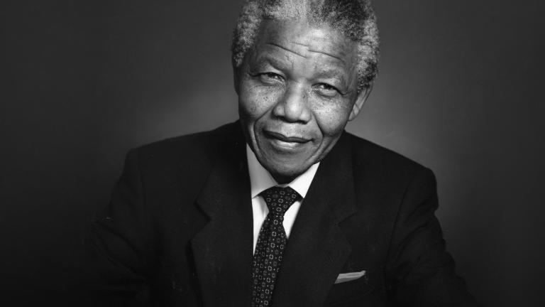 Black and white portrait of Nelson Mandela Partially obscured.
