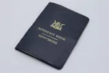 Cover of a booklet resembling a passport.