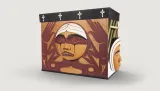 A carved wooden box with the image of an agonized face.