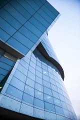 A close-up view of the large panes of glass that surround one half of the Museum.