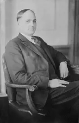 A man sitting in a chair.