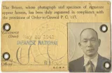 Identification card with the image of a man in the lower right corner.