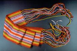 A colourful woven sash.