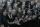 About two dozen youth singing in a choir.