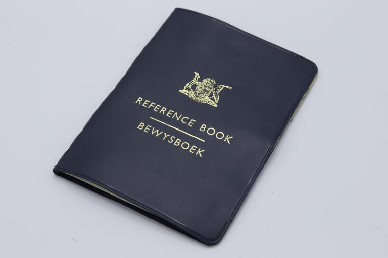 Cover of a booklet resembling a passport.