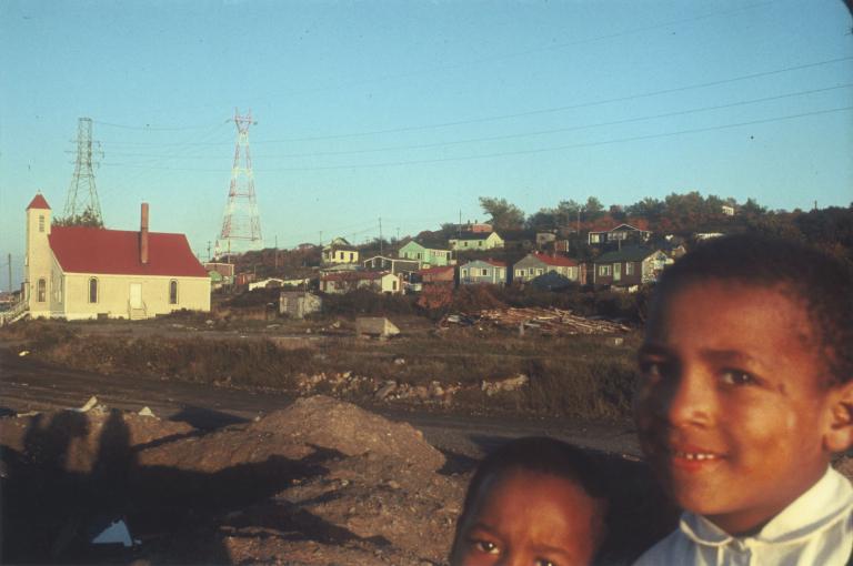  Two children looking at the camera and smiling