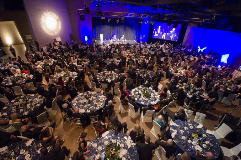 A gala event. Partially obscured.