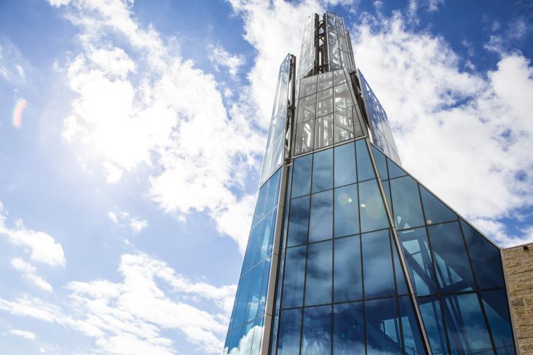 Exterior shot of the glass tower on top of the Museum