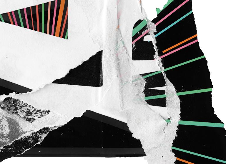 A bundle of torn black and white paper with layers of multicolored pastel stripes. Partially obscured.